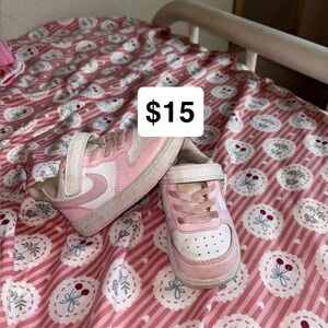 Pink Nike Shoes. Size 6 toddler. A little dirty but no damages. Will clean up!